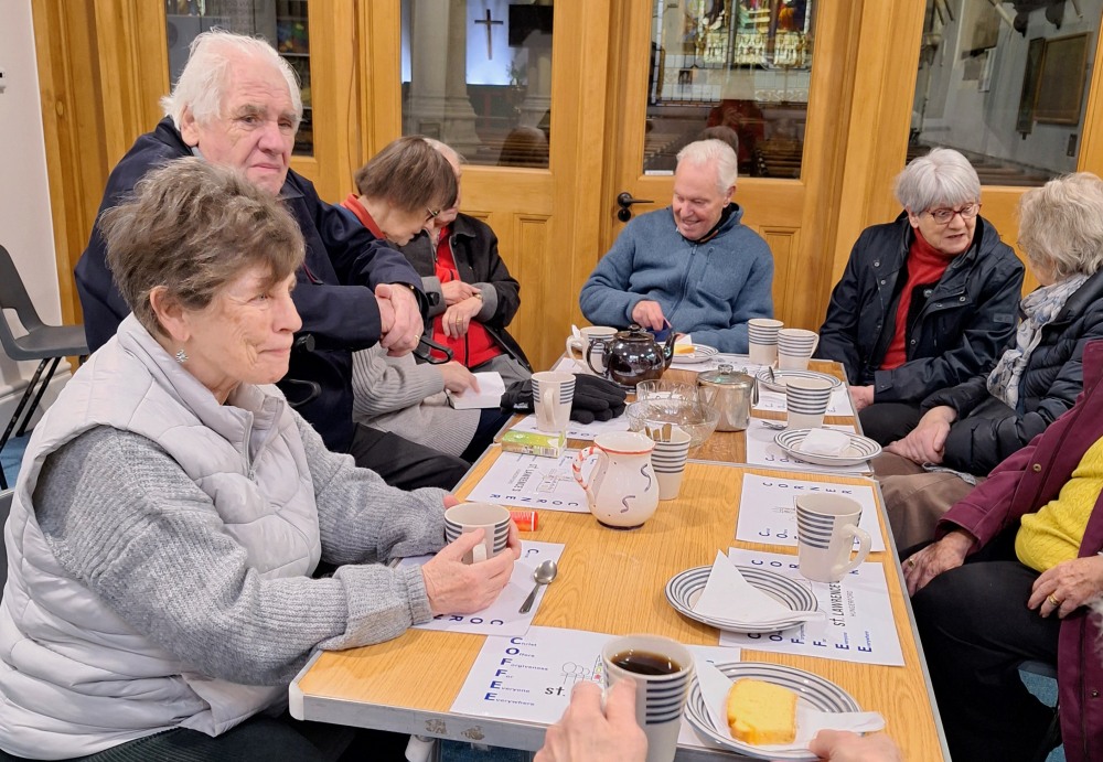 [People enjoying coffee and cake]